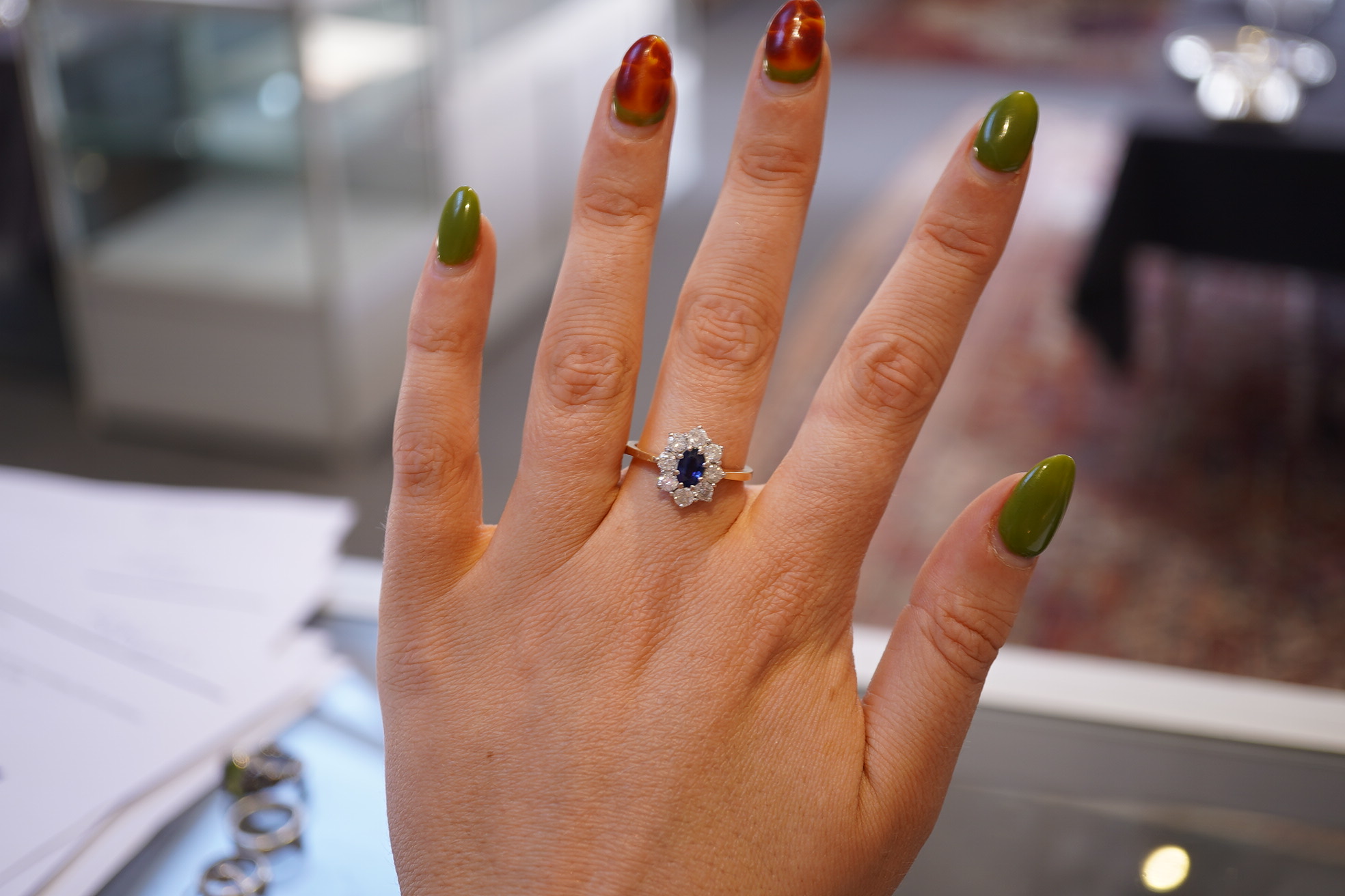 A sapphire and diamond cluster ring
